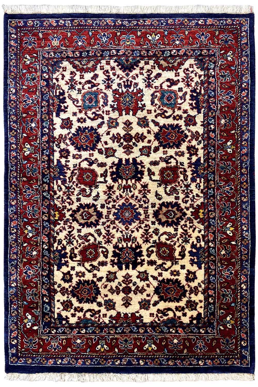 Rug with a large central medallion, beige field, border in red and dark blue