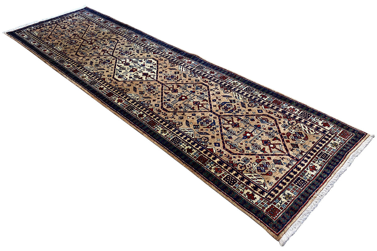 Rug with a multiborder pattern in cream, dark blue, and red, with fringes