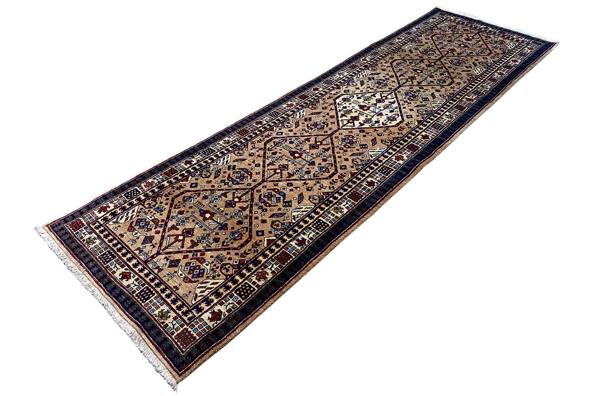 Rug with central medallion and borders, beige, dark blue, red accents, fringe