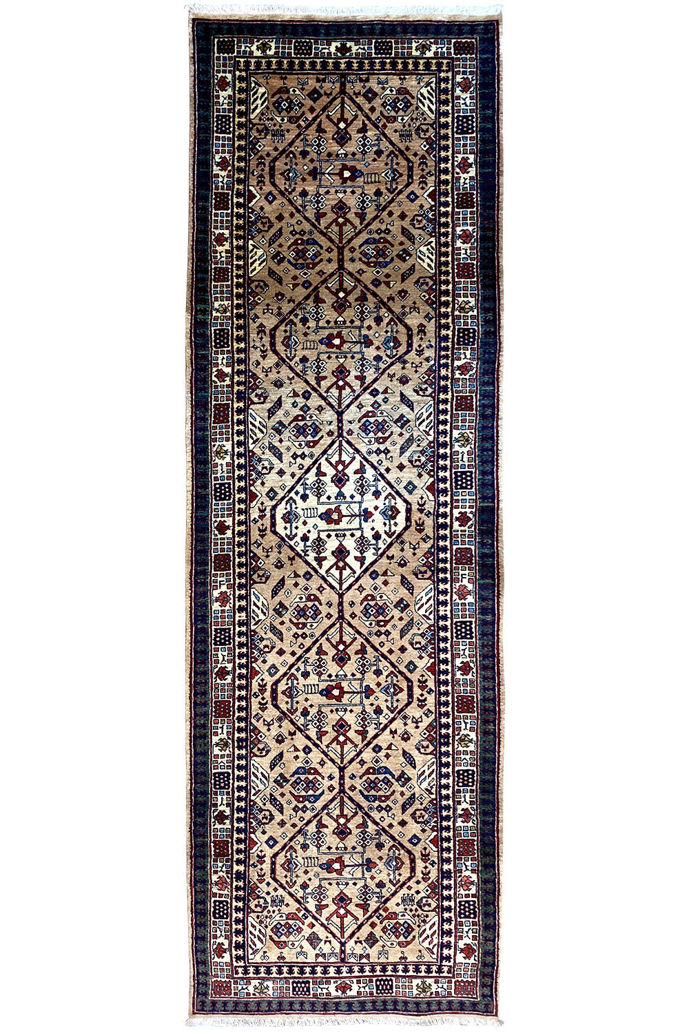 Rug with a blue border, beige and dark blue medallion pattern, and fringes