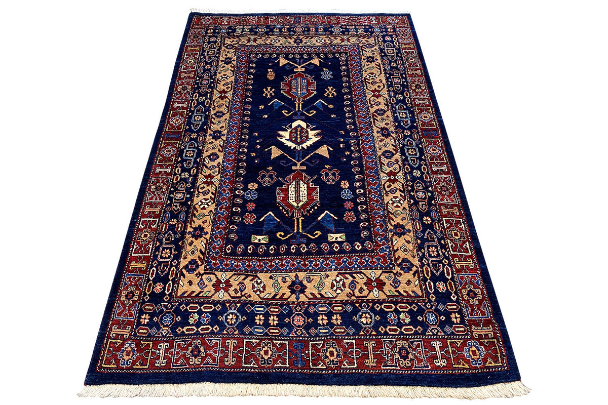 Carpet 183x117 cm with a dark blue base, beige side stripes, and fringes