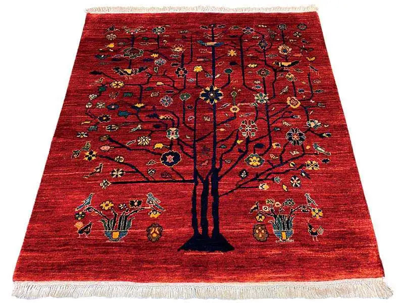 Red Oriental rug with tree motif and fringes, 110x105 cm