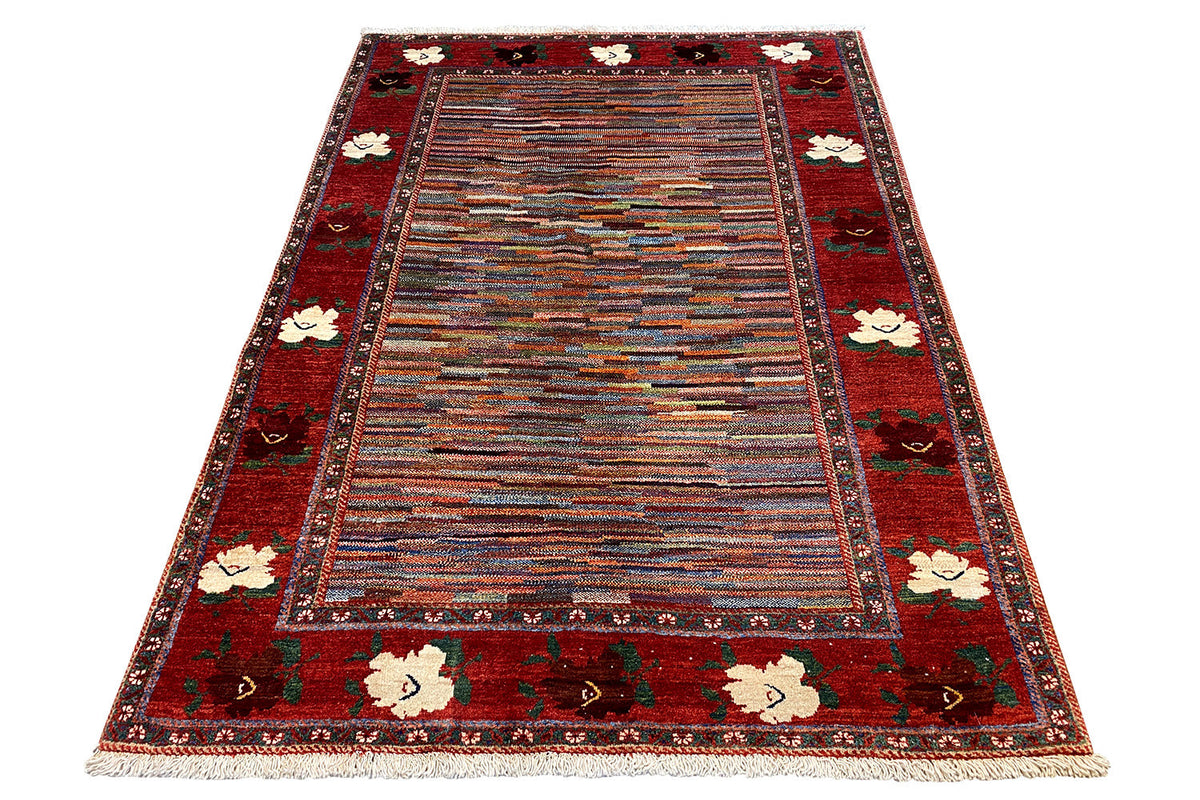 Rectangular rug with a red border, multicolored stripes, and floral medallions