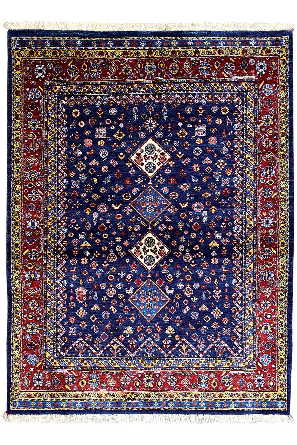 Rectangular blue Oriental rug with a red border and three medallion motifs