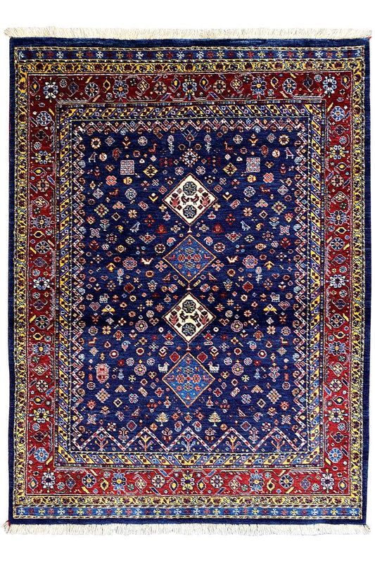 Rectangular blue Oriental rug with a red border and three medallion motifs