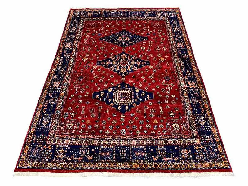 Exclusive Qashqai Oriental rug: red field, dark blue border, 188x130 cm