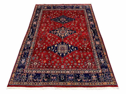 Exclusive Qashqai Oriental rug: red field, dark blue border, 188x130 cm