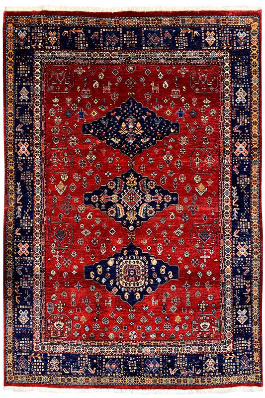 Exclusive Qashqai oriental rug: red with a dark medallion and a wide blue border frame