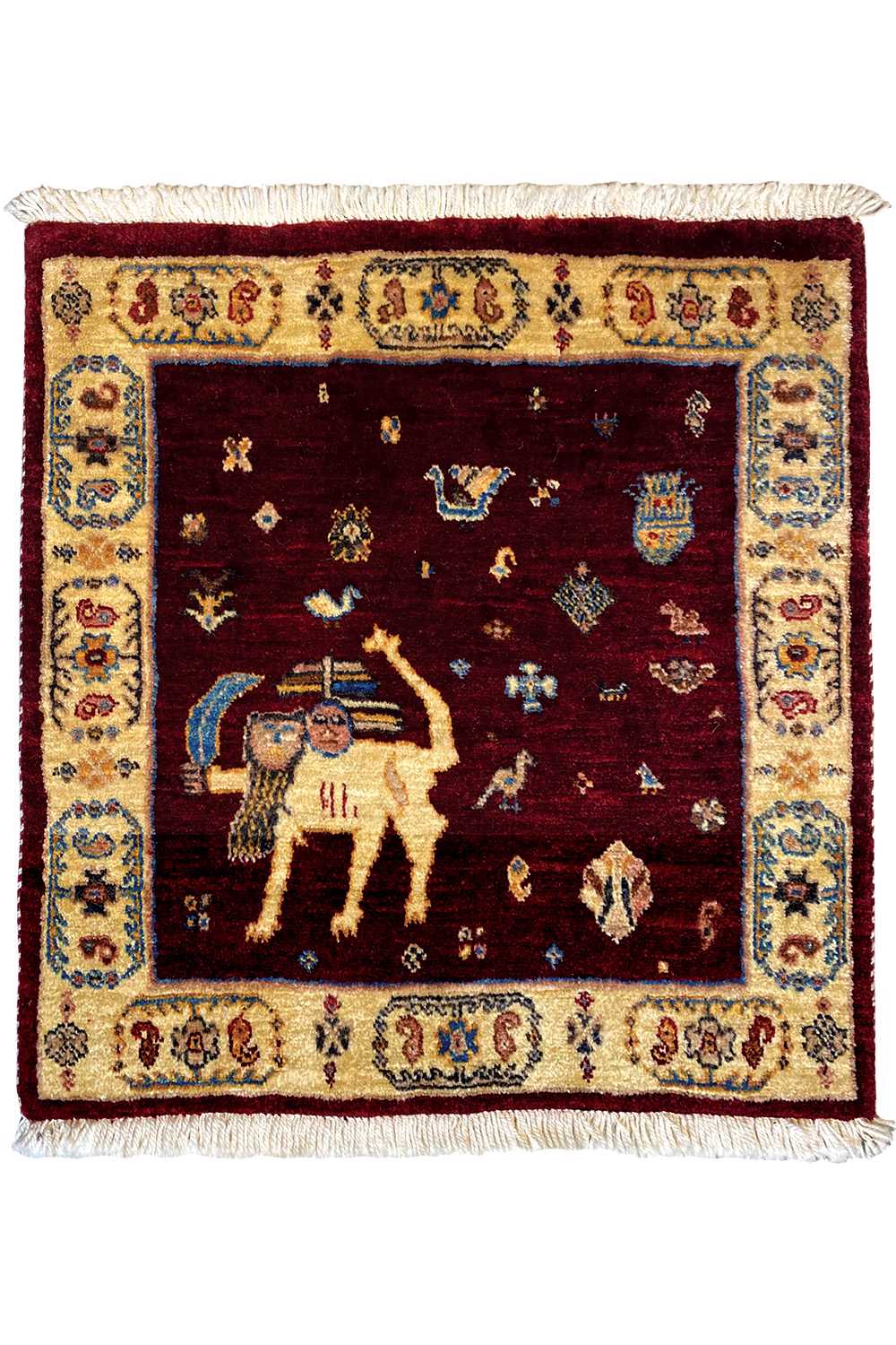 Square rug with a red background, a central animal motif, and a decorative border