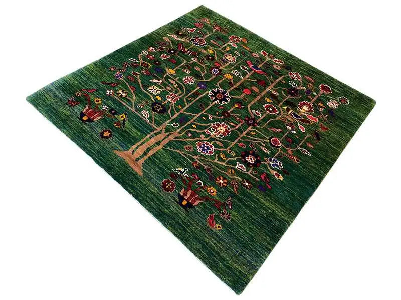 Green Oriental rug with a central tree motif, square, diagonal