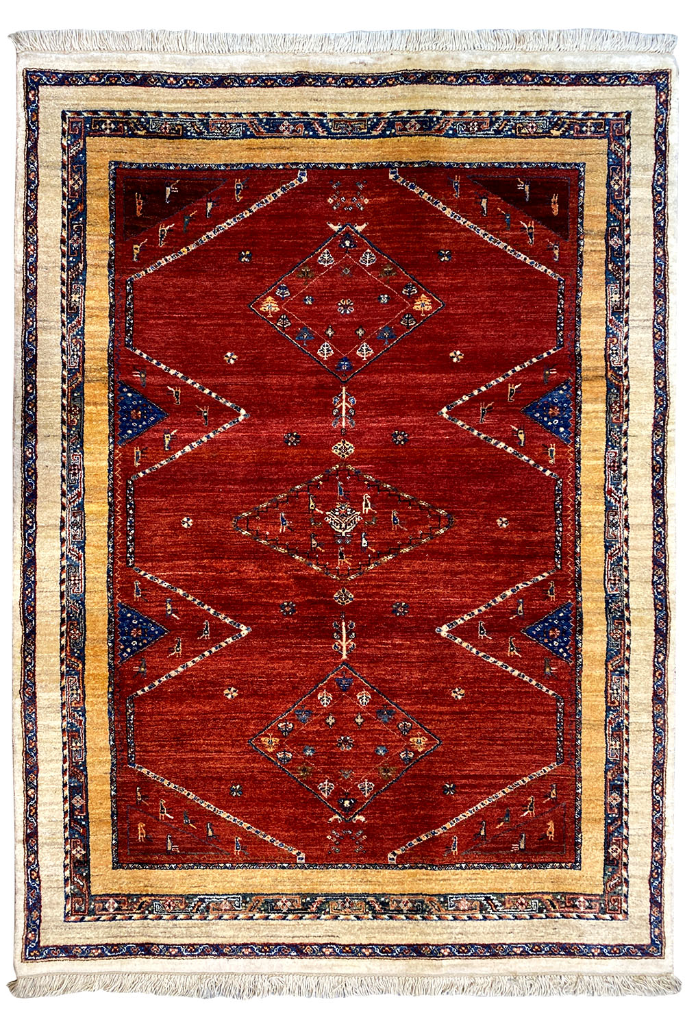 Oriental rug with a red geometric pattern, blue borders and fringes, 193×143 cm