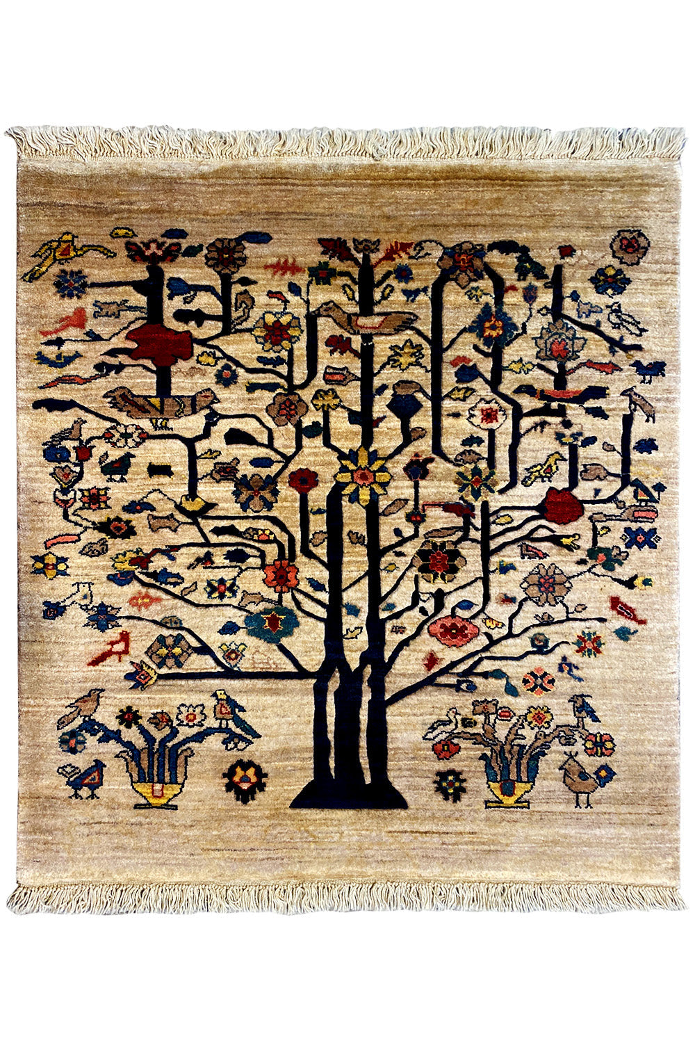 Rug with a beige background, tree motif, and red, blue, and yellow details