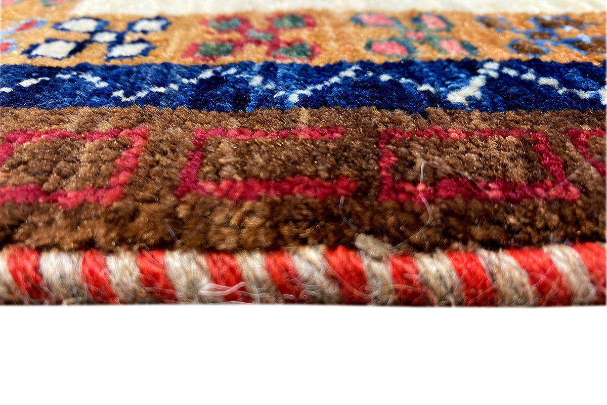 Carpet fringes and selvedges, multicolored border on a beige background