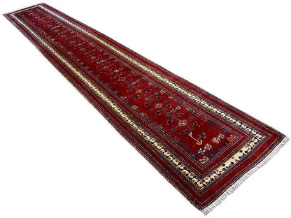 Red runner with narrow decorative borders and a central medallion