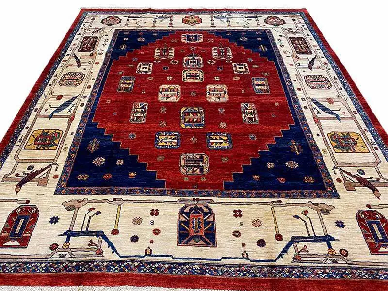 Rug with a red central field, blue border, and beige ornamented areas
