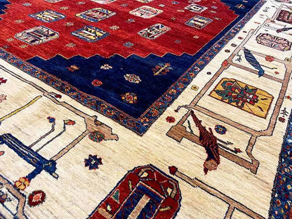 Carpet detail: red and blue areas with delicate beige and multicolored ornaments