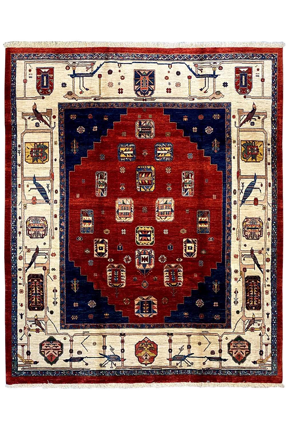 Rug with a red central field, blue border, and multicolored, symmetrical ornaments