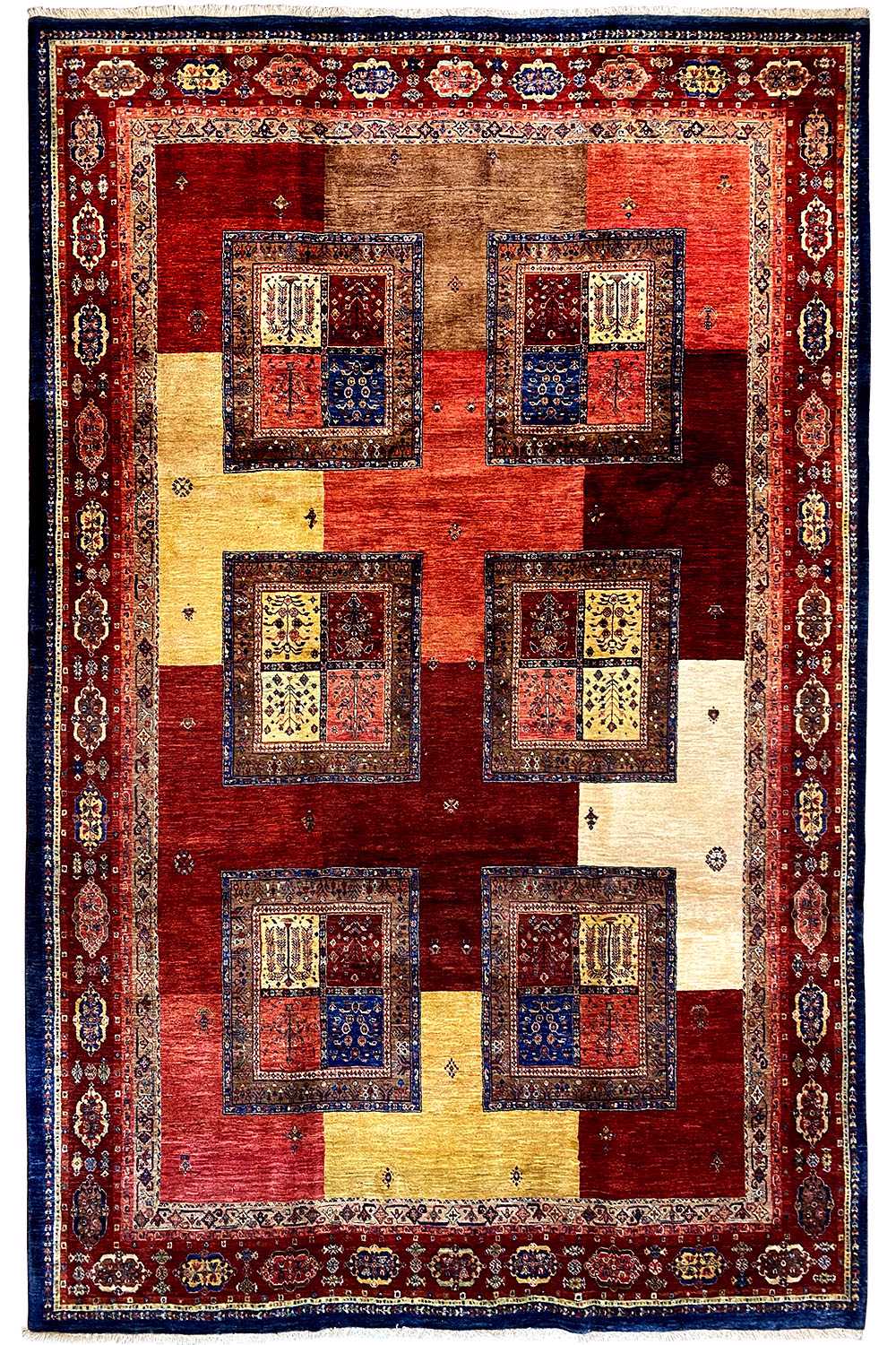 Vintage-style rug: red field with beige and blue squares, surrounded by a border