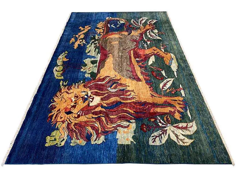 Blue oriental rug with animal and floral motifs, 177x293 cm