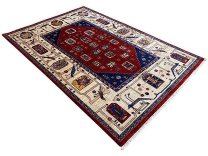 Rectangular oriental rug, red field with blue accents and beige borders