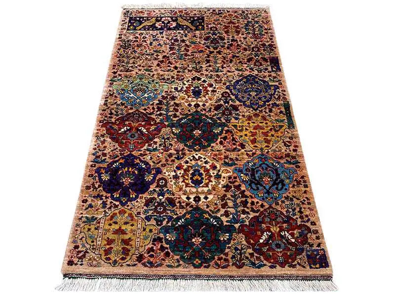 Colorful oriental rug with patchwork design and fringes, rectangular