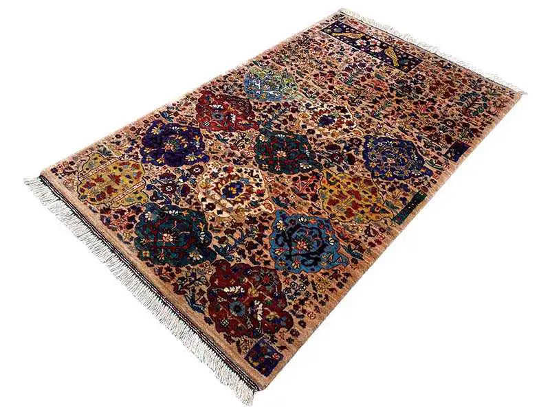 Colorful oriental rug with an ornamental pattern and fringes, rectangular
