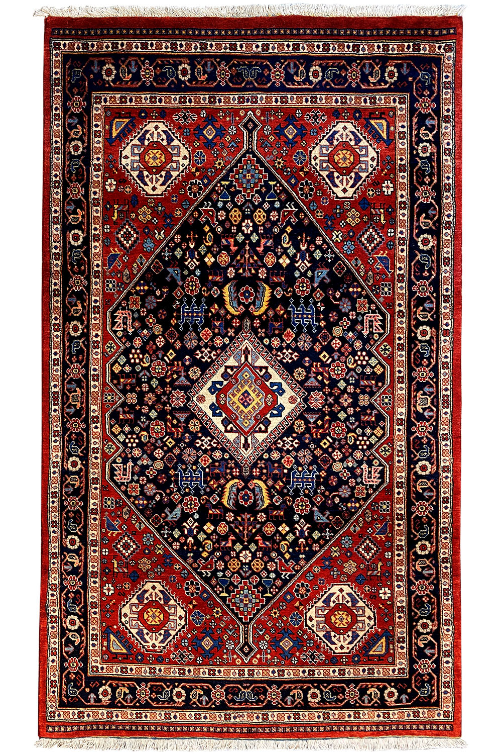 Rug with a red field, black central medallion, and blue-patterned borders