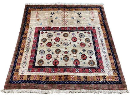 Rug with a square central field, dark border, and beige side ornaments