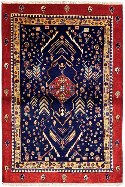 Rug with a dark blue field, red border, and central heraldic medallion design.