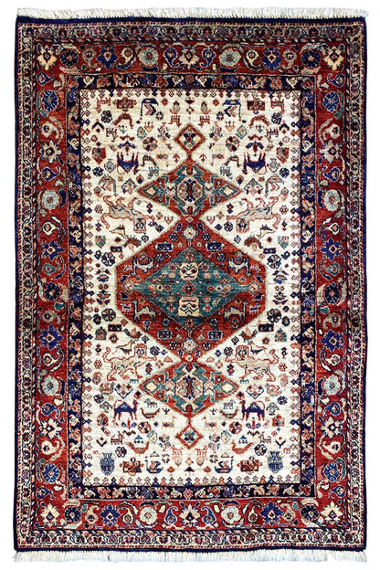 Carpet with a cream-colored ground, red central medallion, and dark blue border