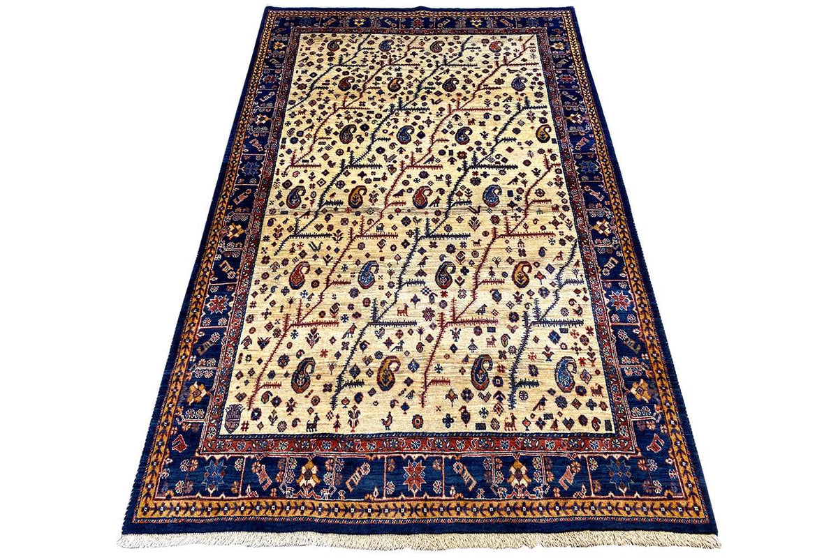 Qashqai rug with blue border and cream-colored ornamental pattern, 192x123 cm