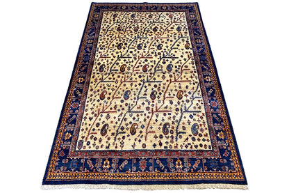 Qashqai rug with blue border and cream-colored ornamental pattern, 192x123 cm