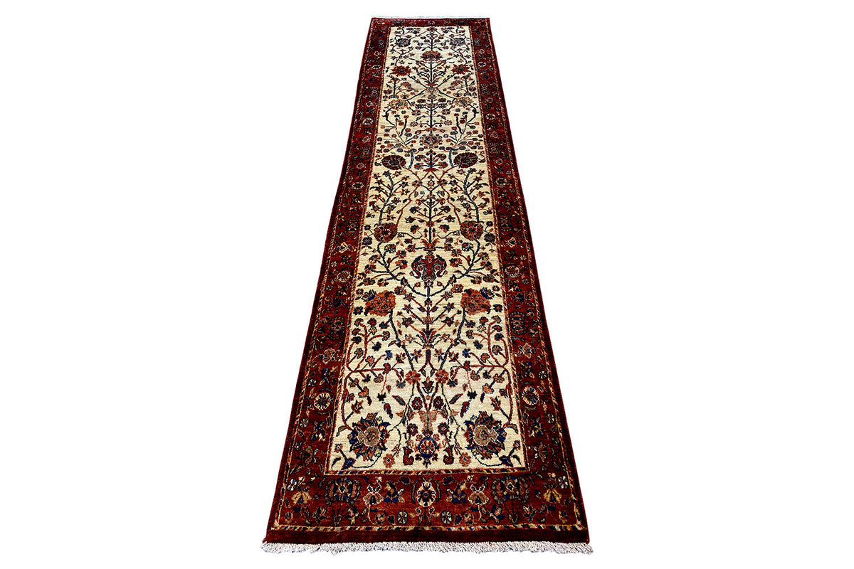 Long oriental rug with a surrounding border pattern and central medallion