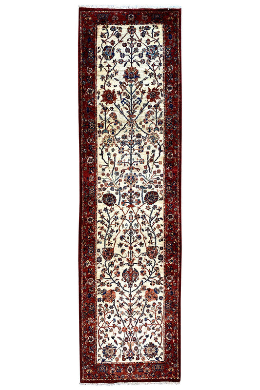 Oriental rug with medallion design, red border, and multicolored ornamental pattern