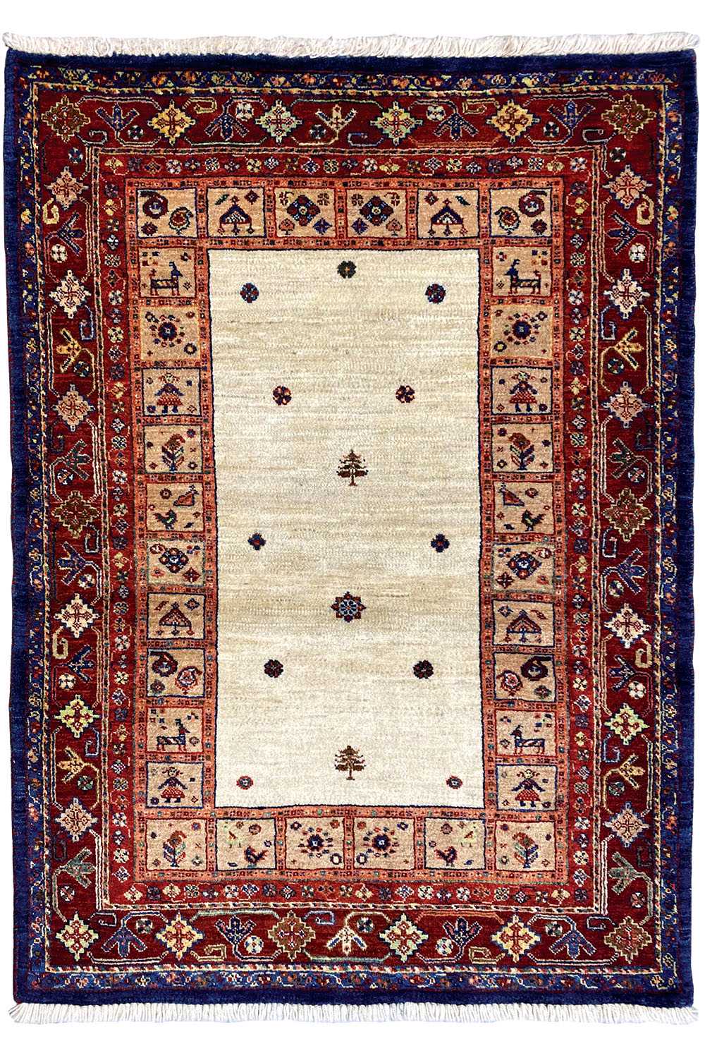 Rug with a light central medallion and a red and blue ornamental border