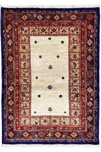 Rug with a light central medallion and a red and blue ornamental border
