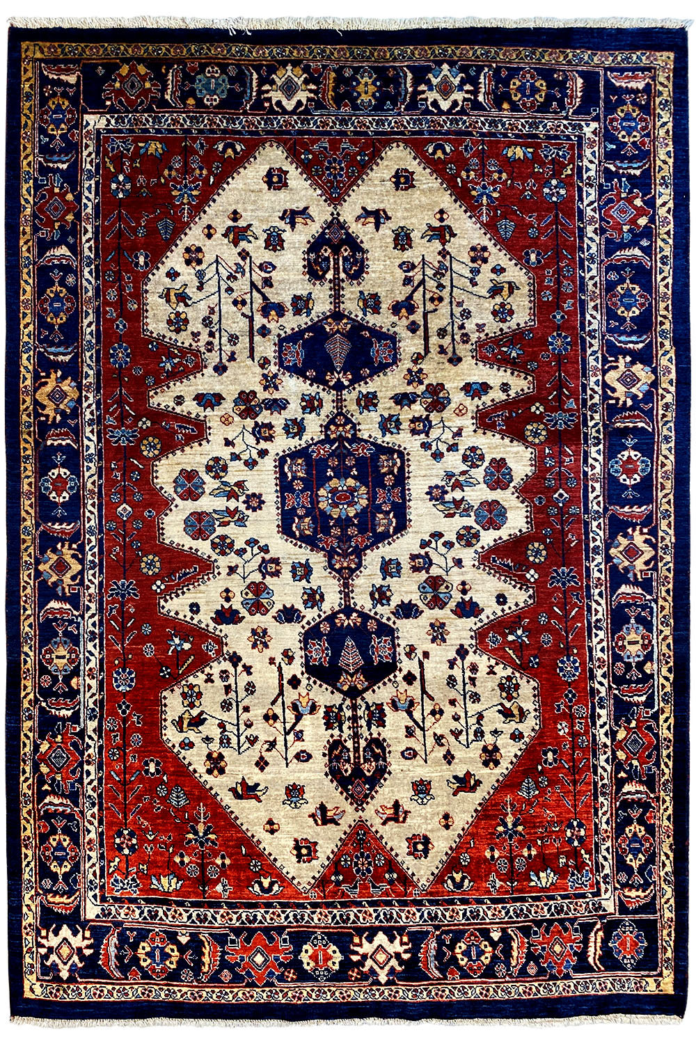 Qashqai exclusive oriental rug with a red and cream-colored pattern and blue borders