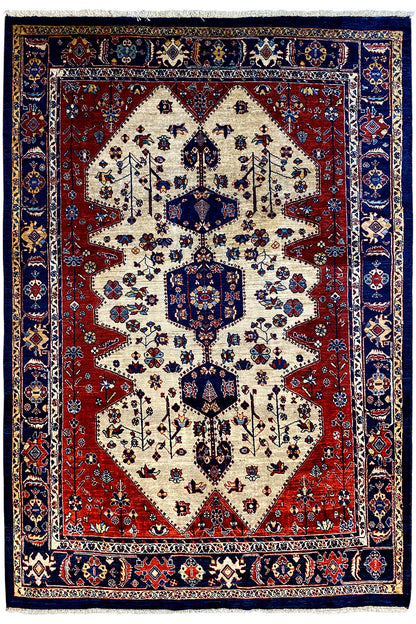Qashqai exclusive oriental rug with a red and cream-colored pattern and blue borders