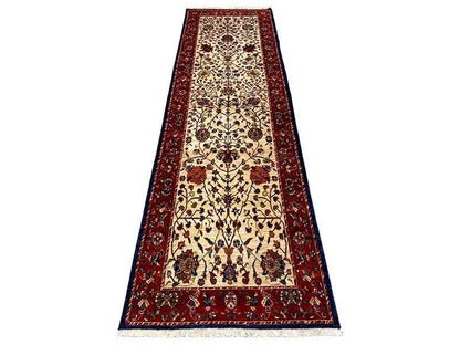 Oriental rug runner, cream-colored central field with a dark red ornamental border
