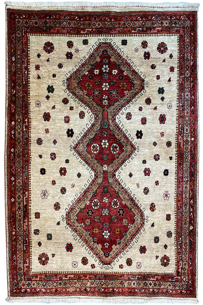Beige rug with a red runner motif and small ornaments, front view