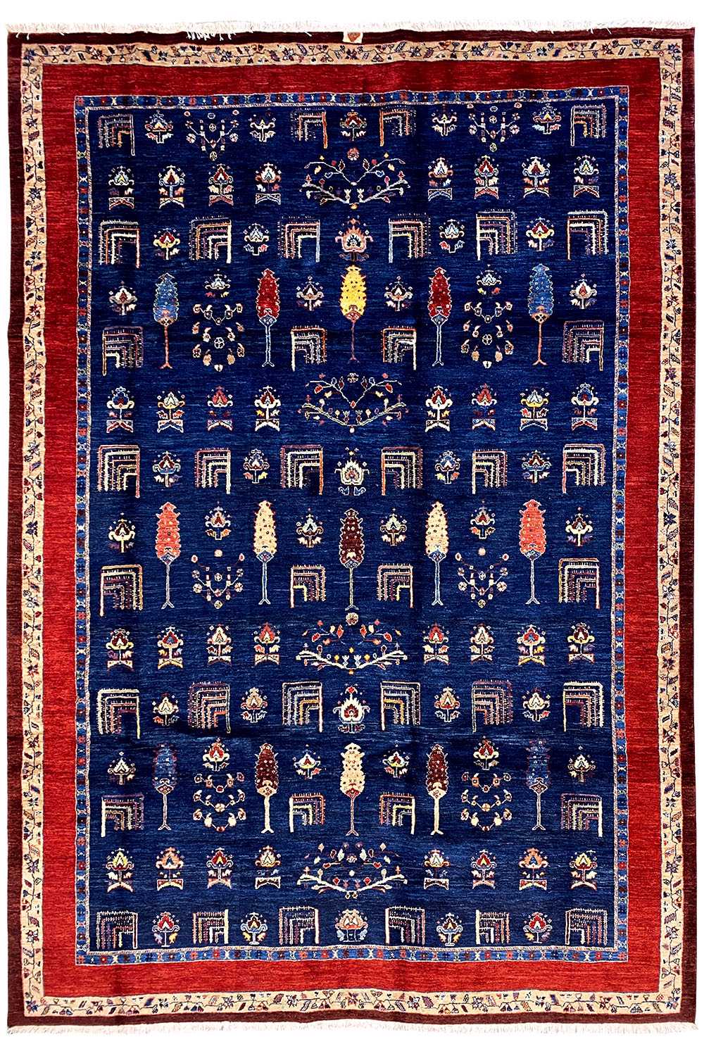 Oriental rug, rectangular: blue medallion pattern with a red border and white trim