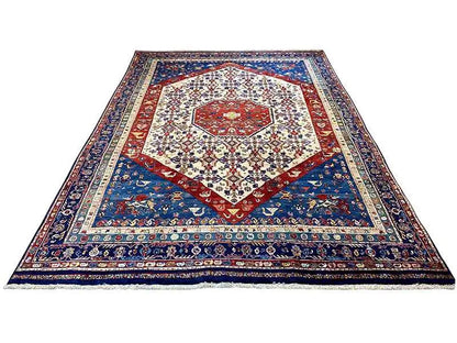 Oriental rug with a blue field, red border frieze, and white patterned center