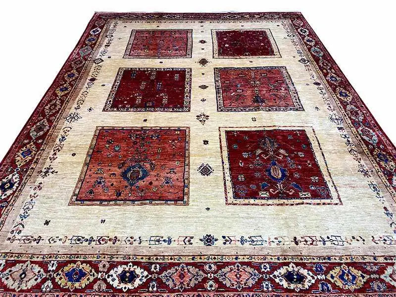 Oriental rug with a red tile pattern on a beige background, rectangular