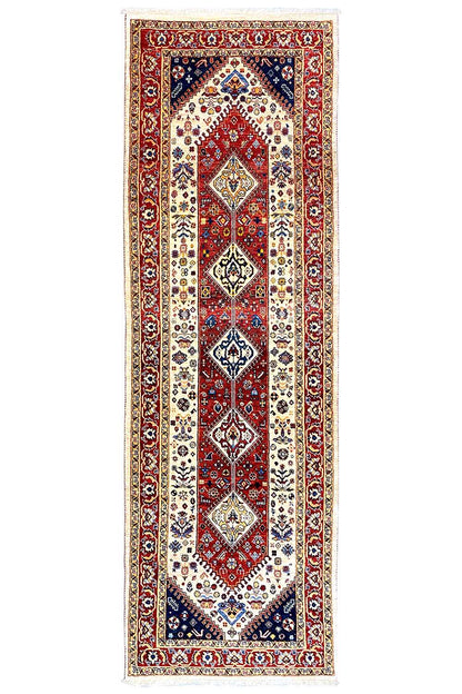 Runner rug with a central medallion, red frame and blue border, rectangular