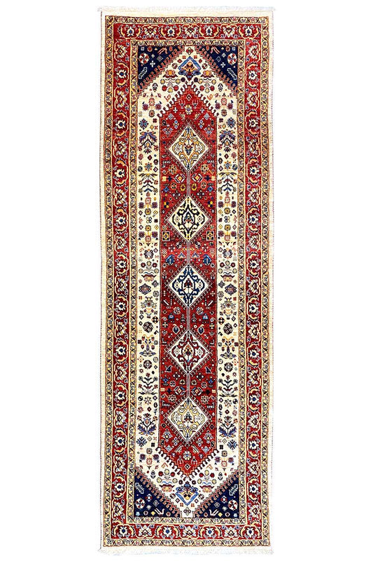 Runner rug with a central medallion, red frame and blue border, rectangular