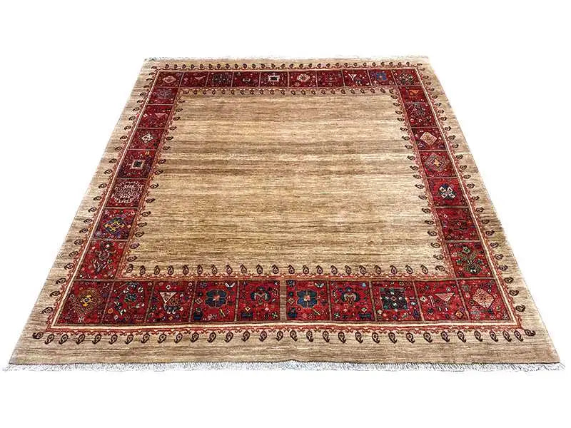 Beige oriental rug with a red border and ornamental frame, all-over pattern
