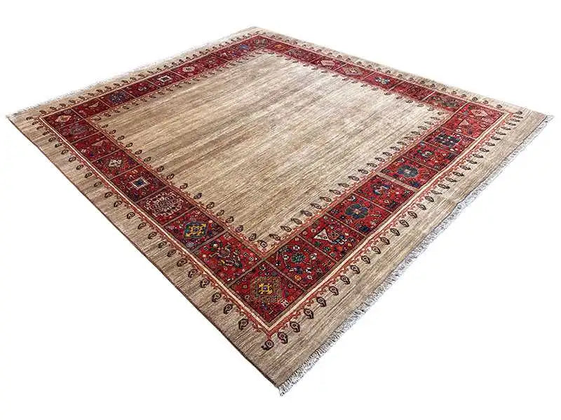 Square Oriental rug with a beige center and a red border of small ornaments