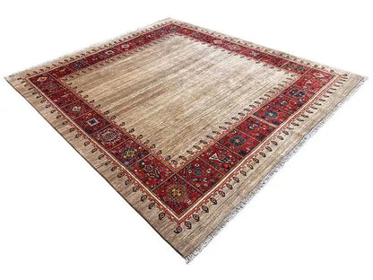 Square Oriental rug with a beige center and a red border of small ornaments