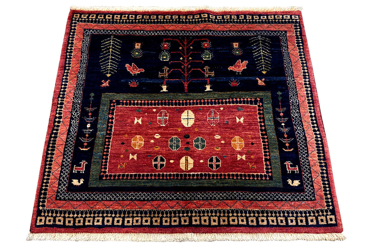 Qashqai Exclusive rug 86x95 cm, symmetrical pattern in blue, red, and gold tones