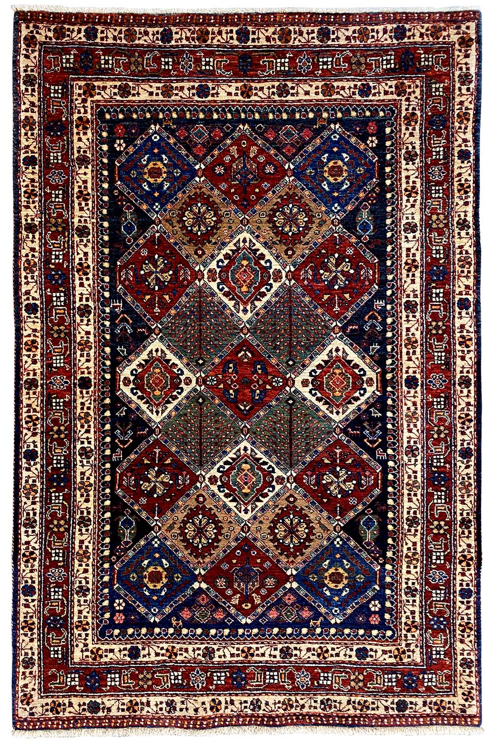 Oriental rug with central diamonds, a red-blue central field, and a geometric border